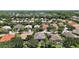 Overhead view of homes in a well-landscaped neighborhood with mature trees at 926 Wood Briar Loop, Sanford, FL 32771