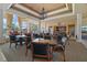 Clubhouse interior featuring abundant seating, elegant decor, and scenic outdoor views at 926 Wood Briar Loop, Sanford, FL 32771
