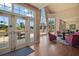 Bright clubhouse featuring comfortable seating, large windows, and hardwood floors at 926 Wood Briar Loop, Sanford, FL 32771