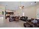 Spacious living room features tile flooring, neutral walls, and connection to an open kitchen area at 926 Wood Briar Loop, Sanford, FL 32771