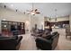 Large living room with a ceiling fan, recessed lighting, tile flooring, and view of open kitchen at 926 Wood Briar Loop, Sanford, FL 32771