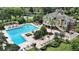 Resort-style pool and clubhouse surrounded by manicured landscaping and inviting amenities at 926 Wood Briar Loop, Sanford, FL 32771