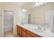 Bright bathroom with double sinks, ample counter space, and a clean, well-maintained appearance at 1539 Osprey View Dr, Apopka, FL 32703