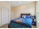 Charming bedroom featuring a comfortable bed with stylish bedding and soft, natural light at 1539 Osprey View Dr, Apopka, FL 32703