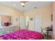 Comfortable bedroom with carpet, ceiling fan, and window for natural light at 1539 Osprey View Dr, Apopka, FL 32703