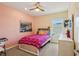 Bright bedroom with ceiling fan, and large window at 1539 Osprey View Dr, Apopka, FL 32703
