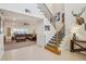 Spacious foyer showcasing staircase, and an open view into the expansive living room at 1539 Osprey View Dr, Apopka, FL 32703