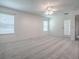 Bright bedroom with carpet flooring, ceiling fan and a window at 1016 Eagles Lndg, Leesburg, FL 34748