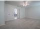 Spacious bedroom features carpet flooring, ceiling fan, and closet space at 1016 Eagles Lndg, Leesburg, FL 34748