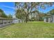 Expansive backyard with mature trees offers a peaceful and private outdoor retreat, perfect for relaxation and outdoor activities at 10301 Us Highway 27 # 187, Clermont, FL 34711
