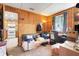 Bedroom with wood paneling and doorway leading to kitchen at 10301 Us Highway 27 # 187, Clermont, FL 34711