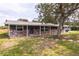 Attractive single-story home with brick accents, covered entry, and lush lawn, perfect for curb appeal at 110 River Beach Dr, Ormond Beach, FL 32176