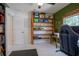 Bright office featuring ample storage space, a desk, ergonomic chair and natural light at 11036 Bronson Rd, Clermont, FL 34711