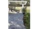 Charming outdoor living space on a paved patio with comfortable seating and a backyard view at 11036 Bronson Rd, Clermont, FL 34711