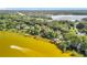 Expansive aerial view of waterfront homes, docks, and surrounding lakes offering a tranquil setting at 1107 Northshore Dr, Eustis, FL 32726