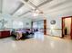 Spacious bedroom with ensuite living room and high beamed ceilings at 1107 Northshore Dr, Eustis, FL 32726