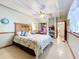 Bright bedroom with a decorative ceiling, fan and plenty of natural light at 1107 Northshore Dr, Eustis, FL 32726