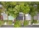 Aerial shot showcases the property's location within a neighborhood with mature trees at 121 Mason Park Dr, Daytona Beach, FL 32117