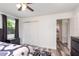 Inviting bedroom with a closet and natural light streaming in from a window at 121 Mason Park Dr, Daytona Beach, FL 32117