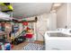 Storage room and laundry with organized shelving, washer, and dryer at 121 Mason Park Dr, Daytona Beach, FL 32117