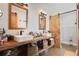 Unique bathroom with a double vanity, vessel sinks, and a rustic wood sliding barn door at 1226 Overlook Rd, Eustis, FL 32726