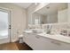 Bathroom featuring a white countertop with an above-counter sink, tile floors, and a large mirror at 1226 Overlook Rd, Eustis, FL 32726