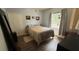 Bedroom with natural light, hardwood flooring, and closet at 130 Southern Pecan Cir # 204, Winter Garden, FL 34787