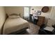 Bedroom with hardwood flooring, natural light, and working space at 130 Southern Pecan Cir # 204, Winter Garden, FL 34787