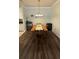 Formal dining room with chandelier lighting and dark wood flooring at 130 Southern Pecan Cir # 204, Winter Garden, FL 34787