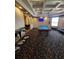 Entertaining game room offers a pool table, wet bar, and unique, stylish decor at 130 Southern Pecan Cir # 204, Winter Garden, FL 34787