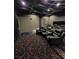 Enjoy a movie in the in-home theater with tiered seating and custom finishes at 130 Southern Pecan Cir # 204, Winter Garden, FL 34787