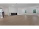 Spacious bonus room with wood-look floors, wet bar, and natural light at 14249 Crest Palm Ave, Windermere, FL 34786
