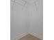 A well-lit walk-in closet includes wire shelving and light wood flooring, perfect for organized storage at 14249 Crest Palm Ave, Windermere, FL 34786