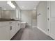 Spacious primary bathroom featuring a double vanity, freestanding tub and glass shower at 14261 Crest Palm Ave, Windermere, FL 34786