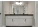 Bathroom features a double vanity with white cabinets and gray countertops, plus modern fixtures at 14261 Crest Palm Ave, Windermere, FL 34786