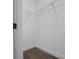 A well-organized closet featuring wire shelving and neutral carpeting at 14261 Crest Palm Ave, Windermere, FL 34786