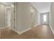 Hallway with access to a half bathroom and a decorative glass front door at 14261 Crest Palm Ave, Windermere, FL 34786