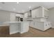 Open kitchen featuring a kitchen island, recessed lighting, and sleek, modern cabinetry at 14261 Crest Palm Ave, Windermere, FL 34786