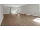 A bright, open living space boasts wood floors and neutral paint, offering versatility for design at 14261 Crest Palm Ave, Windermere, FL 34786