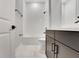 Modern bathroom featuring a tub with white subway tile and dark fixtures at 14285 Crest Palm Ave, Windermere, FL 34786