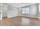 Bright bedroom featuring hardwood floors, natural light, and a walk-in closet at 14285 Crest Palm Ave, Windermere, FL 34786