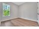Light and airy bedroom with a nice view from the window at 14285 Crest Palm Ave, Windermere, FL 34786