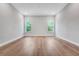 A bright bedroom with nice hardwood floors and big windows at 14285 Crest Palm Ave, Windermere, FL 34786