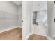 Looking from the walk-in closet to the bathroom featuring a soaking tub at 14285 Crest Palm Ave, Windermere, FL 34786