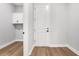 Well-lit laundry room with modern fixtures and white cabinets at 14285 Crest Palm Ave, Windermere, FL 34786