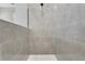 Modern tiled shower with glass enclosure, featuring a luxurious rain shower head at 14285 Crest Palm Ave, Windermere, FL 34786