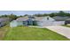 Attractive house with a lush front lawn, perfect for Gathering enjoyment and curb appeal at 15022 Se 94Th Ct, Summerfield, FL 34491