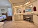 Bathroom features dual sinks, ample lighting, and a vanity area at 175 Hibiscus Way, Leesburg, FL 34748