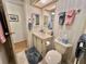 Cozy bathroom featuring a vanity, commode, and fresh decor for a comfortable experience at 175 Hibiscus Way, Leesburg, FL 34748