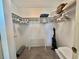Walk-in closet with shelving and space for storage at 175 Hibiscus Way, Leesburg, FL 34748